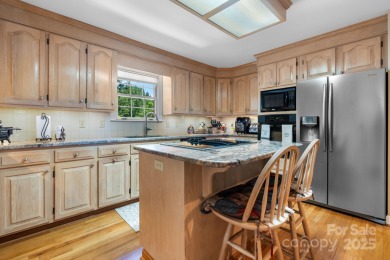 Nestled in the foothills of North Carolina, 2705 Lyle Court NE on Rock Barn Golf and Spa in North Carolina - for sale on GolfHomes.com, golf home, golf lot