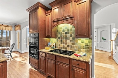 Wake up every day to sweeping golf course views overlooking the on Woodmont Golf and Country Club in Georgia - for sale on GolfHomes.com, golf home, golf lot