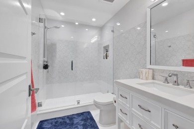FULLY RENOVATED two-story, 3 bedroom + office home in St on St. Andrews Country Club of Boca Raton in Florida - for sale on GolfHomes.com, golf home, golf lot