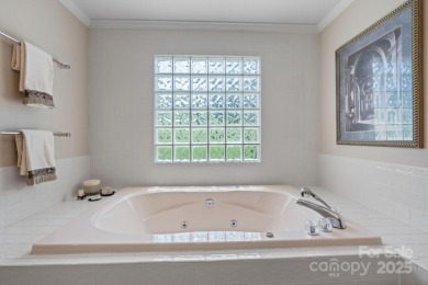 Nestled in the foothills of North Carolina, 2705 Lyle Court NE on Rock Barn Golf and Spa in North Carolina - for sale on GolfHomes.com, golf home, golf lot