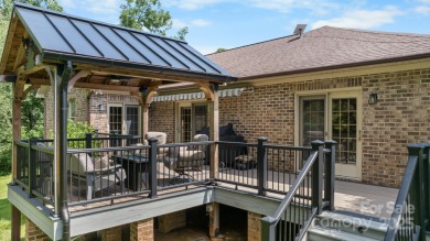 Nestled in the foothills of North Carolina, 2705 Lyle Court NE on Rock Barn Golf and Spa in North Carolina - for sale on GolfHomes.com, golf home, golf lot