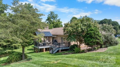 Nestled in the foothills of North Carolina, 2705 Lyle Court NE on Rock Barn Golf and Spa in North Carolina - for sale on GolfHomes.com, golf home, golf lot