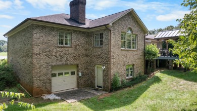 Nestled in the foothills of North Carolina, 2705 Lyle Court NE on Rock Barn Golf and Spa in North Carolina - for sale on GolfHomes.com, golf home, golf lot