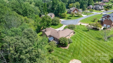 Nestled in the foothills of North Carolina, 2705 Lyle Court NE on Rock Barn Golf and Spa in North Carolina - for sale on GolfHomes.com, golf home, golf lot