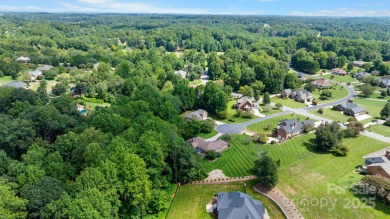 Nestled in the foothills of North Carolina, 2705 Lyle Court NE on Rock Barn Golf and Spa in North Carolina - for sale on GolfHomes.com, golf home, golf lot