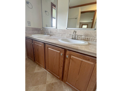 Welcome to this spacious 4-bedroom, 2.5-bath colonial in the on Farmington Hills Golf Club in Michigan - for sale on GolfHomes.com, golf home, golf lot