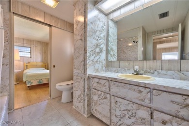 Welcome to your dream home in the prestigious Six Lakes Country on Six Lakes Country Club in Florida - for sale on GolfHomes.com, golf home, golf lot