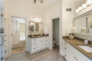 Nestled on a beautifully landscaped half-acre lot in on Chapel Hills Golf and Country Club in Georgia - for sale on GolfHomes.com, golf home, golf lot