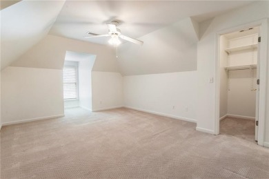 Nestled on a beautifully landscaped half-acre lot in on Chapel Hills Golf and Country Club in Georgia - for sale on GolfHomes.com, golf home, golf lot