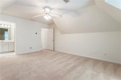 Nestled on a beautifully landscaped half-acre lot in on Chapel Hills Golf and Country Club in Georgia - for sale on GolfHomes.com, golf home, golf lot