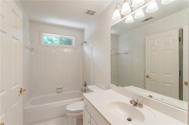 Nestled on a beautifully landscaped half-acre lot in on Chapel Hills Golf and Country Club in Georgia - for sale on GolfHomes.com, golf home, golf lot