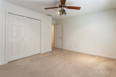 Nestled on a beautifully landscaped half-acre lot in on Chapel Hills Golf and Country Club in Georgia - for sale on GolfHomes.com, golf home, golf lot