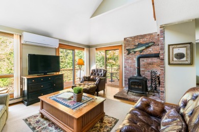 Eastman condo with 3 levels of living space and beautiful sunset on Eastman Golf Links in New Hampshire - for sale on GolfHomes.com, golf home, golf lot