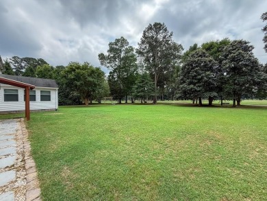 This 3 bedroom 2 bath home sits on almost one acre with peaceful on Eastern Shore Yacht and Country Club in Virginia - for sale on GolfHomes.com, golf home, golf lot