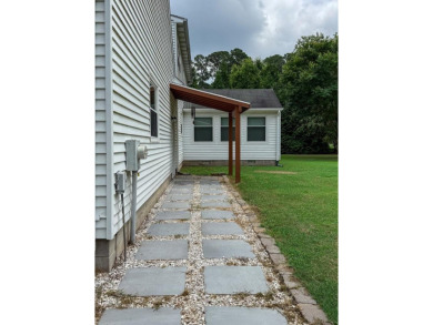 This 3 bedroom 2 bath home sits on almost one acre with peaceful on Eastern Shore Yacht and Country Club in Virginia - for sale on GolfHomes.com, golf home, golf lot