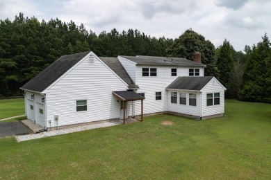 This 3 bedroom 2 bath home sits on almost one acre with peaceful on Eastern Shore Yacht and Country Club in Virginia - for sale on GolfHomes.com, golf home, golf lot
