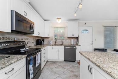ATTENTION BOATERS! This Gulf access home comes beautifully on Saint Andrews South Golf Club in Florida - for sale on GolfHomes.com, golf home, golf lot
