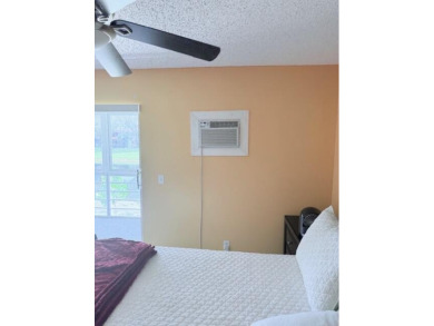 You will enjoy this 2nd floor, furnished 1 bedroom 1.5 bath unit on Hillsboro Pines Golf in Florida - for sale on GolfHomes.com, golf home, golf lot