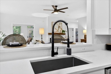 Imagine mornings that begin with coffee on the patio, surrounded on Haile Plantation Golf and Country Club in Florida - for sale on GolfHomes.com, golf home, golf lot