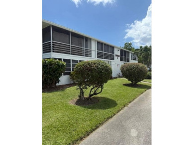 You will enjoy this 2nd floor, furnished 1 bedroom 1.5 bath unit on Hillsboro Pines Golf in Florida - for sale on GolfHomes.com, golf home, golf lot
