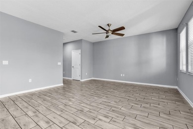 One or more photo(s) has been virtually staged. Discover luxury on ChampionsGate Golf Resort in Florida - for sale on GolfHomes.com, golf home, golf lot