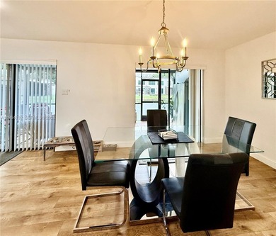 Enjoy a luxury condo living experience at The Trellises at on Jacaranda Golf Club in Florida - for sale on GolfHomes.com, golf home, golf lot