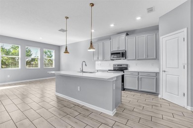 One or more photo(s) has been virtually staged. Discover luxury on ChampionsGate Golf Resort in Florida - for sale on GolfHomes.com, golf home, golf lot