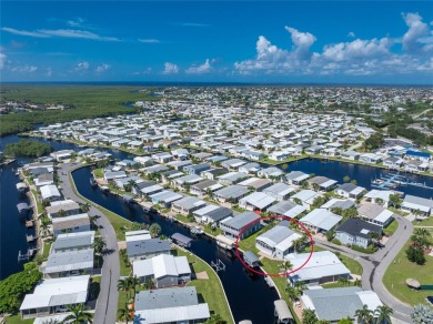 ATTENTION BOATERS! This Gulf access home comes beautifully on Saint Andrews South Golf Club in Florida - for sale on GolfHomes.com, golf home, golf lot
