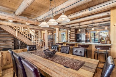 This stunning log home backs to open space, the National Forest on Keystone Ranch Golf Course in Colorado - for sale on GolfHomes.com, golf home, golf lot