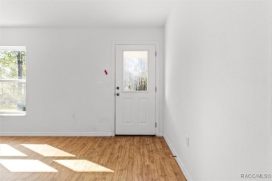 Escape to privacy and space with this 2017-built 3 bedroom, 2 on Pine Ridge Community Golf and Country Club in Florida - for sale on GolfHomes.com, golf home, golf lot