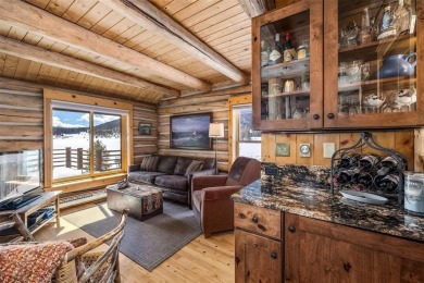 This stunning log home backs to open space, the National Forest on Keystone Ranch Golf Course in Colorado - for sale on GolfHomes.com, golf home, golf lot