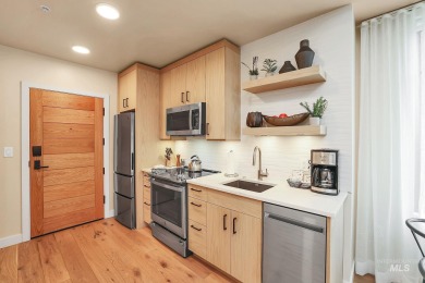Village-facing end unit in the heart of Tamarack! This spacious on Osprey Meadows at Tamarack Resort in Idaho - for sale on GolfHomes.com, golf home, golf lot
