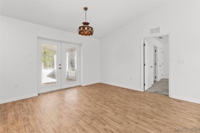 Escape to privacy and space with this 2017-built 3 bedroom, 2 on Pine Ridge Community Golf and Country Club in Florida - for sale on GolfHomes.com, golf home, golf lot