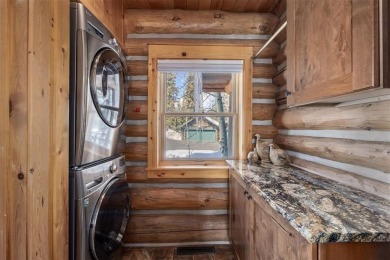 This stunning log home backs to open space, the National Forest on Keystone Ranch Golf Course in Colorado - for sale on GolfHomes.com, golf home, golf lot