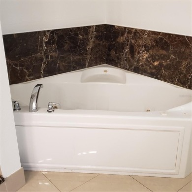 Spacious 3-Bedroom, 2-Bath Condo with Lake View - Prime Orlando on MetroWest Golf Club in Florida - for sale on GolfHomes.com, golf home, golf lot