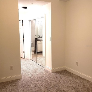 Spacious 3-Bedroom, 2-Bath Condo with Lake View - Prime Orlando on MetroWest Golf Club in Florida - for sale on GolfHomes.com, golf home, golf lot