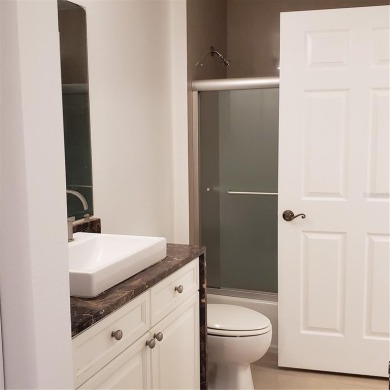 Spacious 3-Bedroom, 2-Bath Condo with Lake View - Prime Orlando on MetroWest Golf Club in Florida - for sale on GolfHomes.com, golf home, golf lot