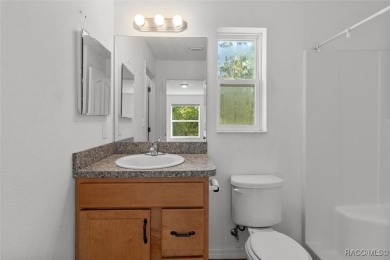 Escape to privacy and space with this 2017-built 3 bedroom, 2 on Pine Ridge Community Golf and Country Club in Florida - for sale on GolfHomes.com, golf home, golf lot