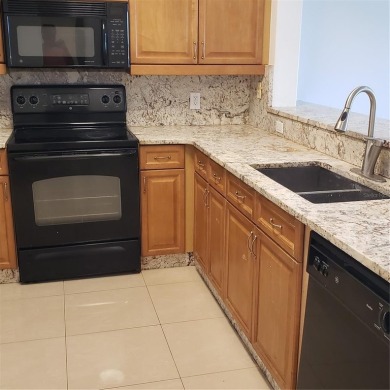 Spacious 3-Bedroom, 2-Bath Condo with Lake View - Prime Orlando on MetroWest Golf Club in Florida - for sale on GolfHomes.com, golf home, golf lot