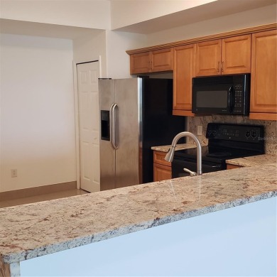 Spacious 3-Bedroom, 2-Bath Condo with Lake View - Prime Orlando on MetroWest Golf Club in Florida - for sale on GolfHomes.com, golf home, golf lot