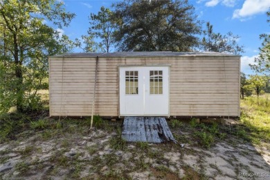 Escape to privacy and space with this 2017-built 3 bedroom, 2 on Pine Ridge Community Golf and Country Club in Florida - for sale on GolfHomes.com, golf home, golf lot