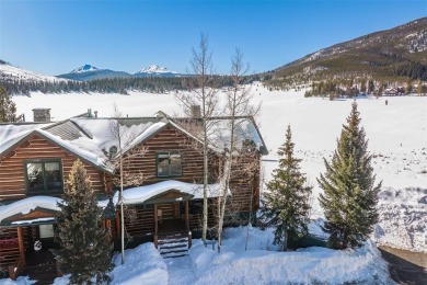 This stunning log home backs to open space, the National Forest on Keystone Ranch Golf Course in Colorado - for sale on GolfHomes.com, golf home, golf lot