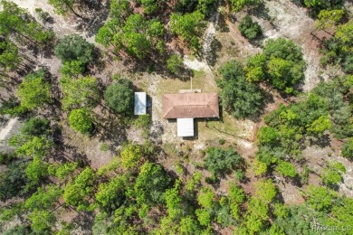 Escape to privacy and space with this 2017-built 3 bedroom, 2 on Pine Ridge Community Golf and Country Club in Florida - for sale on GolfHomes.com, golf home, golf lot
