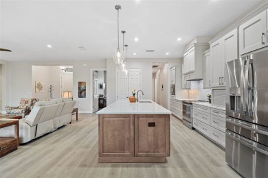 Come discover this stunning residence situated in Harbor Hills on Harbor Hills Country Club in Florida - for sale on GolfHomes.com, golf home, golf lot