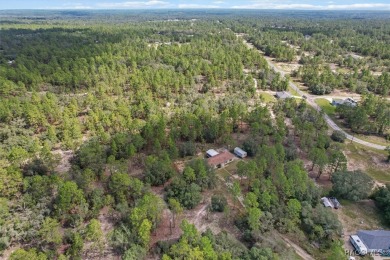 Escape to privacy and space with this 2017-built 3 bedroom, 2 on Pine Ridge Community Golf and Country Club in Florida - for sale on GolfHomes.com, golf home, golf lot