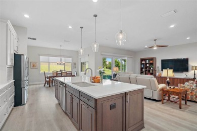 Come discover this stunning residence situated in Harbor Hills on Harbor Hills Country Club in Florida - for sale on GolfHomes.com, golf home, golf lot