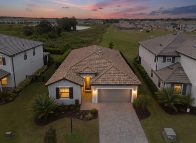 Nestled in one of Southwest Florida's most sought-after on Lakewood National Golf Club in Florida - for sale on GolfHomes.com, golf home, golf lot