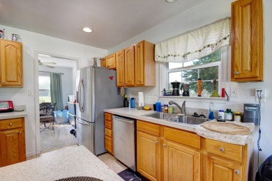 Step into charm and comfort with this beautiful 4 bed, 2.5 bath on Captains Cove Golf and Yacht Club in Virginia - for sale on GolfHomes.com, golf home, golf lot