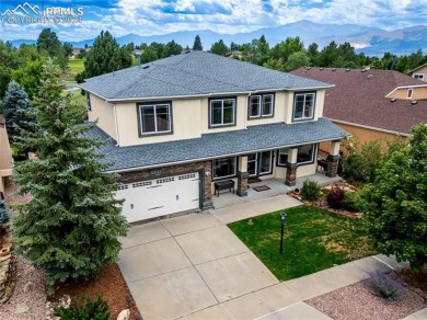 This beautiful home overlooking Pine Creek Golf Course is on Pine Creek Golf Club in Colorado - for sale on GolfHomes.com, golf home, golf lot