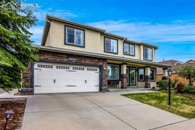 This beautiful home overlooking Pine Creek Golf Course is on Pine Creek Golf Club in Colorado - for sale on GolfHomes.com, golf home, golf lot